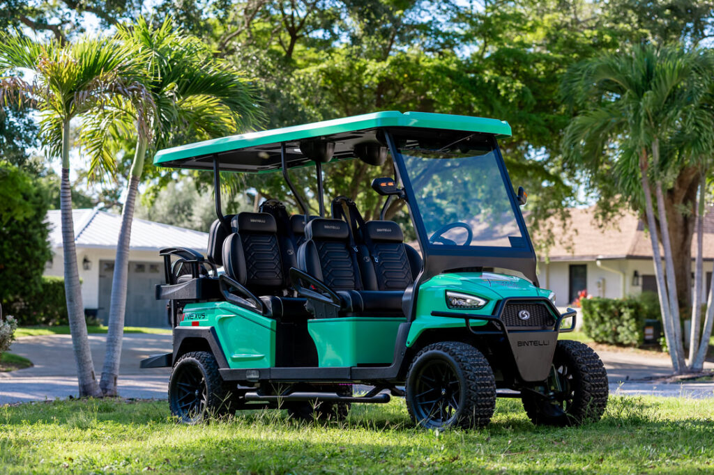 Green 4 & 6-seat Bintelli golf cart rental on Anna Maria Island
