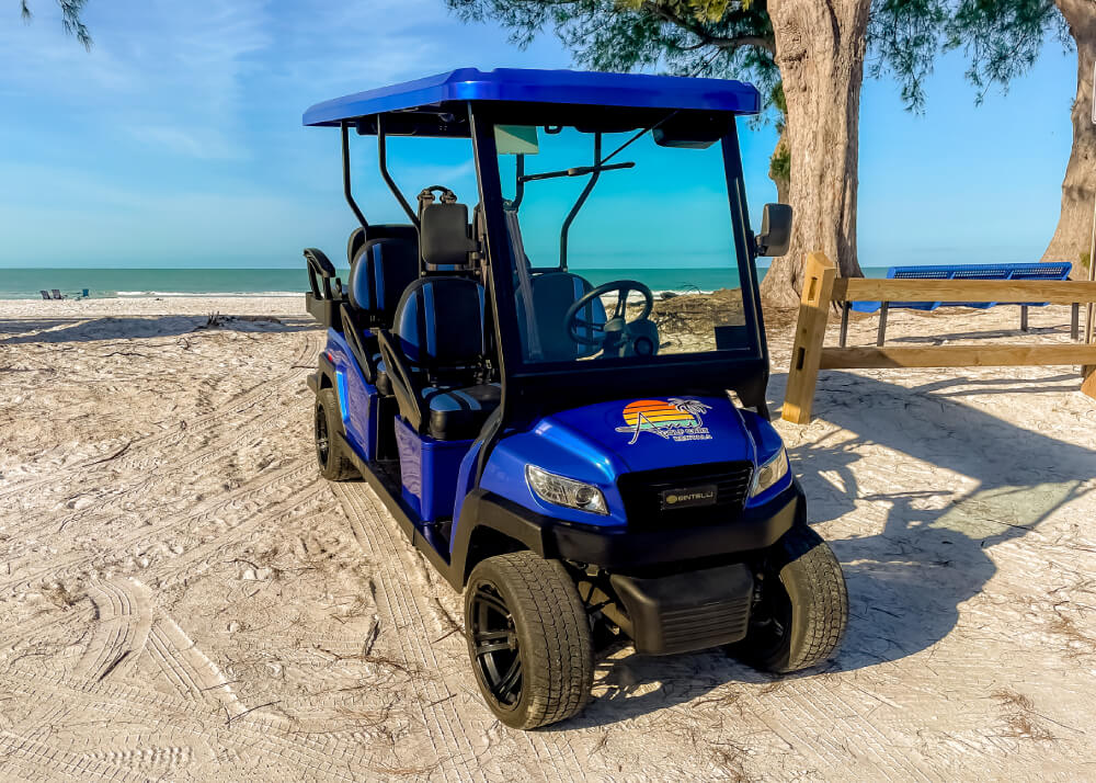 Blue 4-seat Bintelli golf cart rental on Anna Maria Island