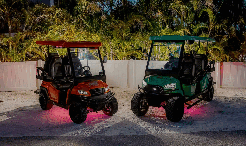 Anna Maria Island golf cart rentals featuring a 4-seat and 6-seat street-legal electric cart with colorful underglow lighting, perfect for family vacations.